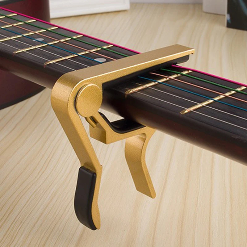 1/2 個高品質ギターカポ複数の色が利用可能ギタートーン調整 - Guitar Capo Clip のレビューと価格