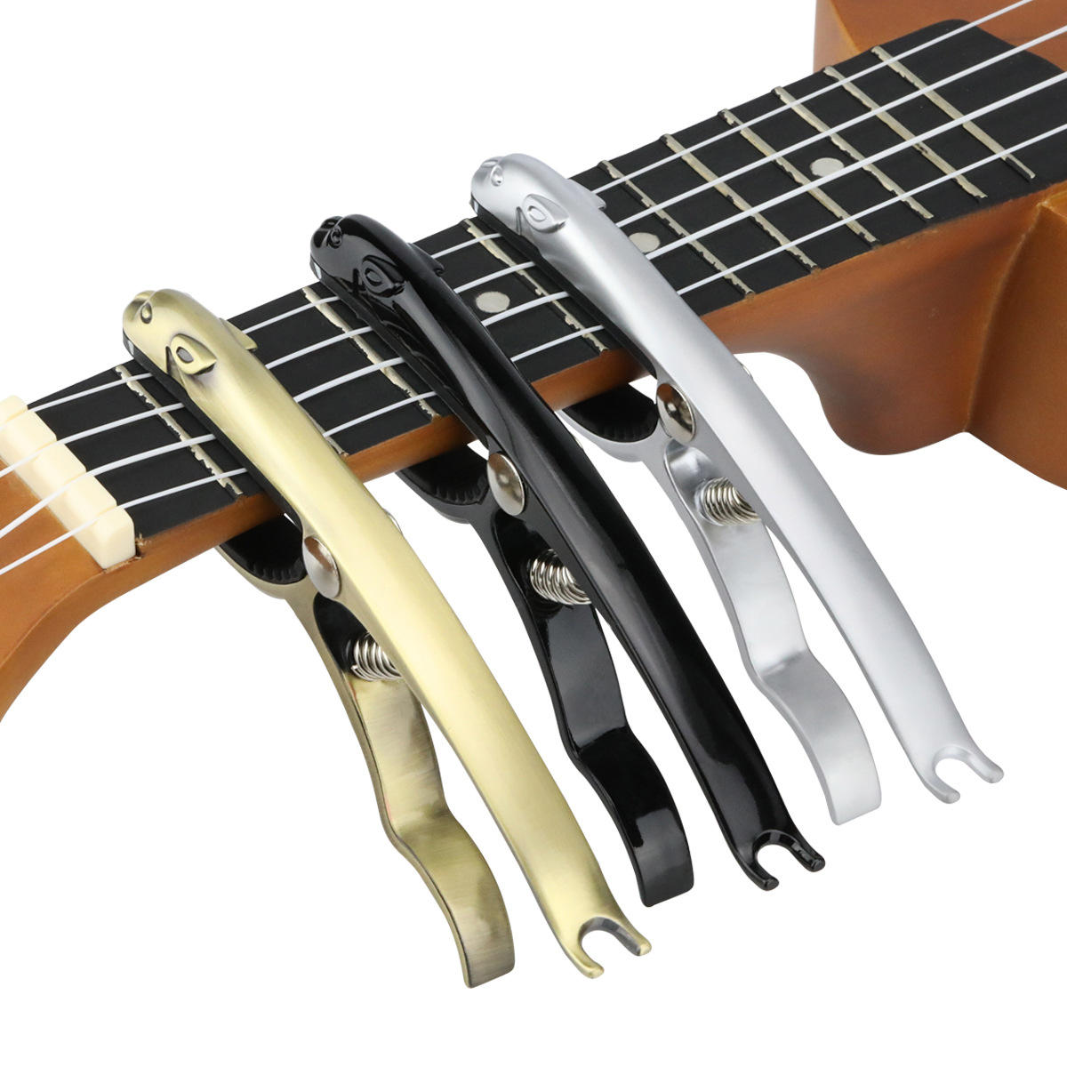 プロフェッショナルメタルギターカポアルミ合金クランプキートリ - Guitar Capo Clip のレビューと価格